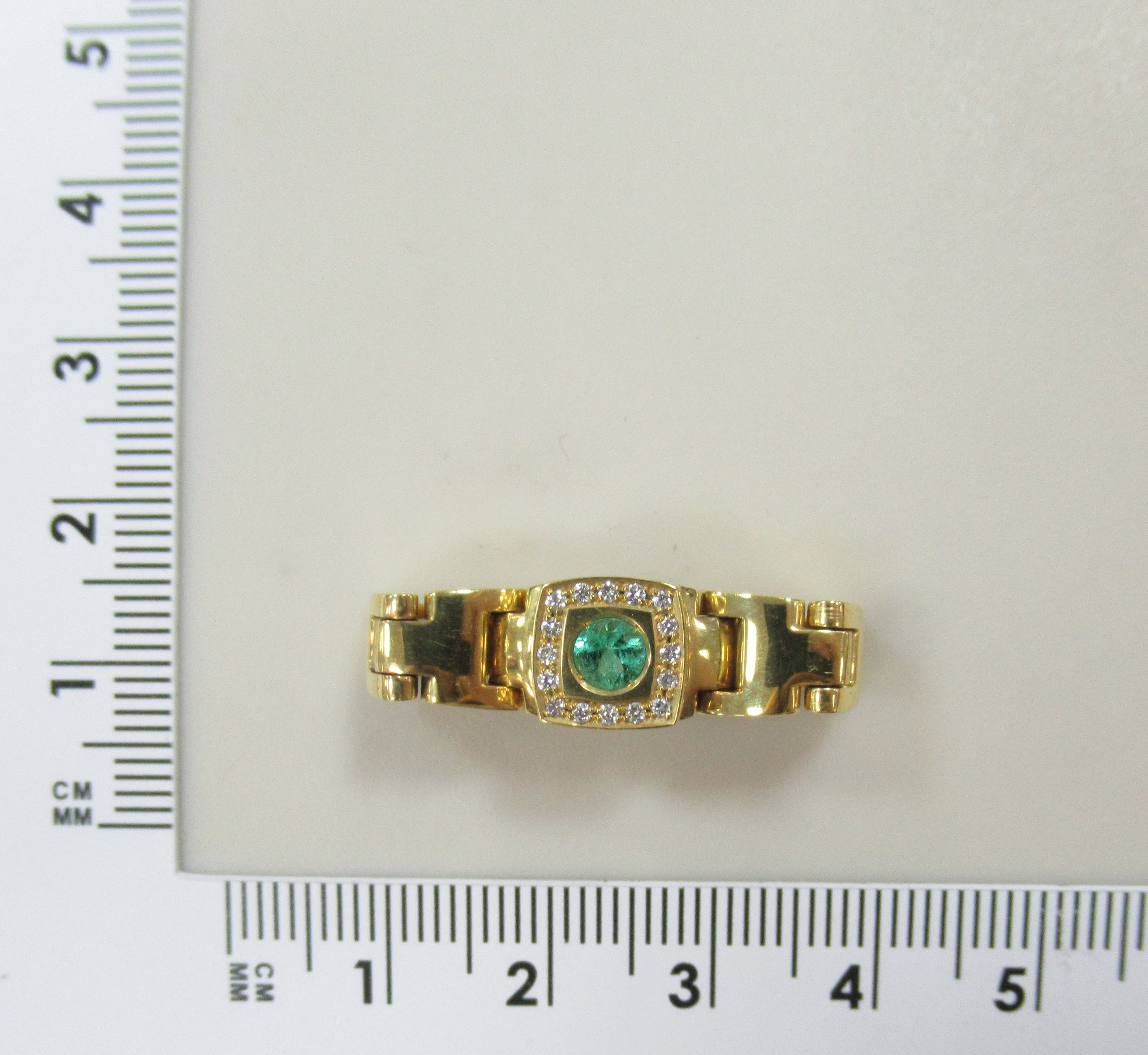 Кольцо из желтого золота с изумрудом